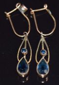 A pair of 9ct gold earrings set with paste, 1.4g