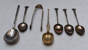 Hallmarked silver spoons and nips including a silver gilt replica spoon, Mappin & Webb jam spoon and