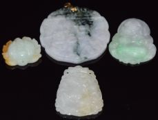 Four Chinese jade pendants, largest 4.8cm