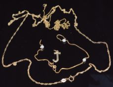 A 9ct gold bracelet, two 9ct gold chains, and a 9ct gold J pendant, 4.1g