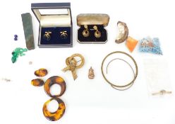 A collection of jewellery including a section of opal, bloodstone, T bar, brooch, Holland & Sherry