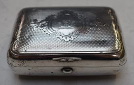 Russian white metal ciagarette case with engine turned lid, 84 silver marks, length 9cm, weight