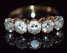 A 9ct gold ring set with five cubic zirconia, 3.2g, size P/Q