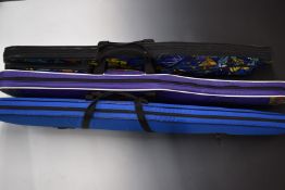 Three padded rifle or gun slips, all with additional outer pockets, one by Holme.