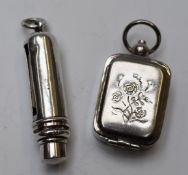 Novelty white metal roller or coil type stamp dispenser, marked sterling silver, length 5.5cm and