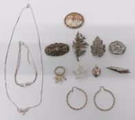 Silver brooches, cameo brooch, silver earrings, silver necklace with matching bracelet, etc