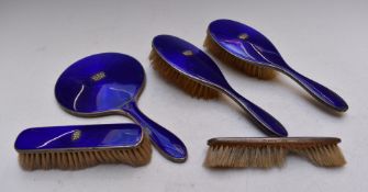 George V hallmarked silver and blue guilloché enamel dressing table set comprising hand mirror and