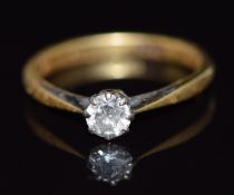 An 18ct gold ring set with a round cut diamond of approximately 0.25ct, 2.5g, size L/M