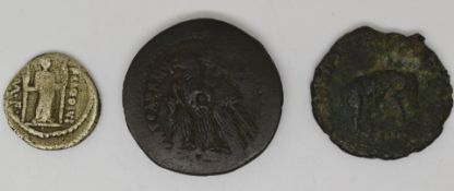 Greek bronze Ptolomy coin together with a Roman silver coin Empress, possibly Faustina, obverse, and