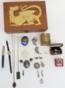 A collection of jewellery including silver pendant set with tiger's eye, silver and enamel pot,