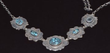 A signed De Chelly silver Navajo necklace set with turquoise