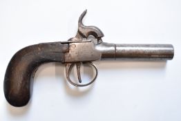 Percussion hammer action pocket pistol with wooden grip and 2.25 inch turn off barrel, overall