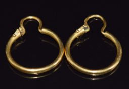 A pair of yellow metal hoop earrings, 4.9g