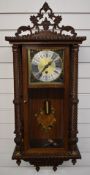 20thC German wall clock with single train fusee movement, in inlaid marquetry case with barley twist