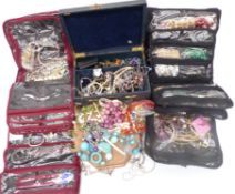 A collection of costume jewellery including peridot necklace, beaded necklaces, bracelets,