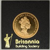 1987 Royal Mint one ounce gold Britannia uncirculated, in Perspex case