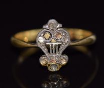 An 18ct gold ring set with rose cut diamonds, 1.8g, size L