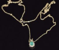 A 9ct gold necklace and a 9ct gold pendant set with an emerald and diamonds, 1.5g