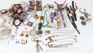 A collection of costume jewellery including watches, rings, Miracle pendants, necklace including