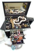 A collection of silver and costume jewellery including Rado beads, earrings, necklaces including