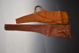 Two brown leather carbine rifle slips.