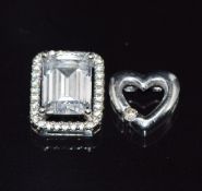 A 9ct white gold heart pendant set with a diamond and a 9k white gold pendant, 2.9g