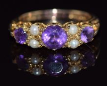 A 9ct gold ring set with an amethyst and pearls, 3.7g, size O
