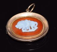 Victorian mourning locket set with a agate with a section depicting cupid as a lion tamer, verso a