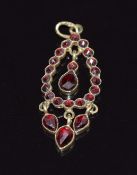 A 14k gold pendant set with Bohemian cut garnets, 1.7g, length 3.5cm