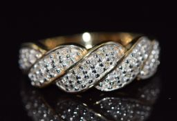 A 9ct gold ring set with diamonds, 2.7g, size K