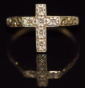 A 9ct gold ring in the form of a cross, with engraved decoration, 1.7g, size P