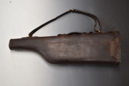 Brown leather leg of mutton shotgun case with fitted interior, wool lining and brass lock, 80cm