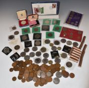 A collection of UK crowns including two cased silver examples, Isle of Man, sundry coins, cased sets