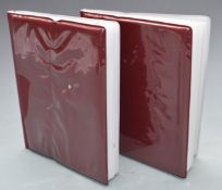 Seventy two used mostly clean world banknotes, in two small albums