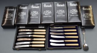Seven boxes of Harrods anti-tarnish cutlery rolls, cased cutlery and a large quantity of plated