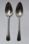 Pair of George III hallmarked silver Old English pattern table spoons, London 1702, maker Thomas