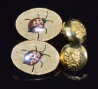A pair of Mulberry cufflinks with ladybird decoration