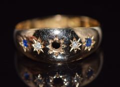 A 15ct gold ring set with diamonds and sapphires, Birmingham 1895, 2.4g, size M