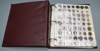 An amateur collection of overseas and UK coinage in an album, includes a sub collection of USA
