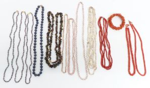 Three coral necklaces, a coral bracelet, necklaces including pearl, tourmaline, etc