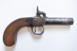 Percussion hammer action pocket pistol with wooden grip and 2.25 inch rifled turn off barrel,