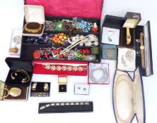 A collection of jewellery including brooches, earrings, necklaces, etc
