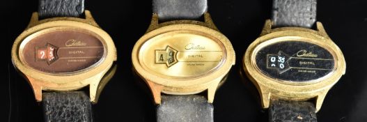 Three Chateau gentleman's gold plated digital jump hour wristwatches, on black leather straps,