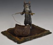 19th/20thC Franz Bergman cold painted bronze of a cat standing on a rug with bag, W19 x D16 x H15cm