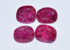 Four loose oval cut rubies, total 4.54ct