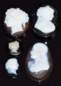 Five c1900 carved agate cameos depicting classical figures, largest 1.8x 1.2cm