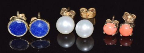 Three pairs of 9ct gold earrings variously set with lapis lazuli, coral and pearls, 3.4g