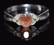 A 9ct white gold ring set with a topaz and diamonds, 2.8g, size N