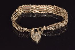 A 9ct gold gate bracelet with heart padlock, 24.9g