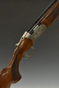 Beretta Ultra Light 12 bore over and under ejector shotgun with engraved scenes of birds to the